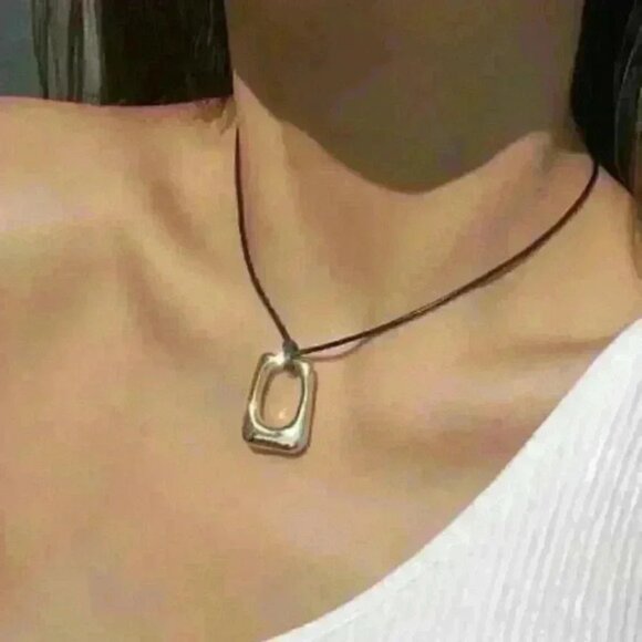 New Geometric Pendant Cord Necklace on a Black Cord - Picture 2 of 2